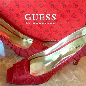Mildly worn Guess satin peep toe stiletto heel